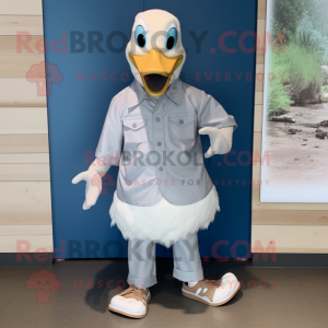 Silver Geese mascot costume character dressed with a Dress Shirt and Shoe clips