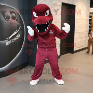 Maroon Hydra mascot costume character dressed with a Joggers and Hats