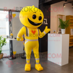 Yellow Arrow Of Love mascot costume character dressed with a Culottes and Suspenders