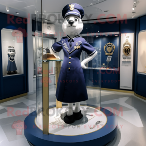 Navy Hourglass mascot costume character dressed with a A-Line Skirt and Brooches