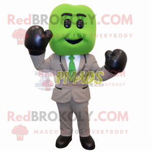 Olive Boxing Glove mascot costume character dressed with a Suit Jacket and Digital watches
