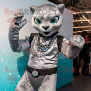Silver Jaguarundi mascot costume character dressed with a Jeggings and Bracelet watches