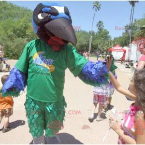 Mascotte d'oiseau vert bleu blanc et noir de corbeau -