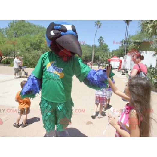 Mascotte d'oiseau vert bleu blanc et noir de corbeau -