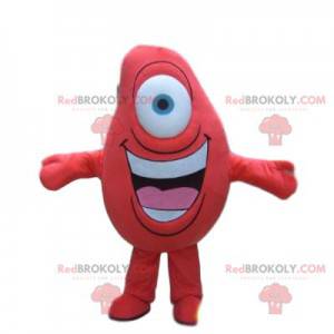 Mascote vermelho com um olho e um sorriso enorme -