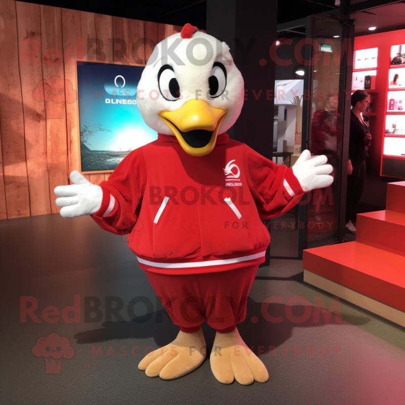 Red Swans mascot costume character dressed with a Sweatshirt and Clutch bags