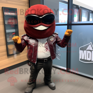 Maroon Fish Tacos mascot costume character dressed with a Biker Jacket and Tie pins