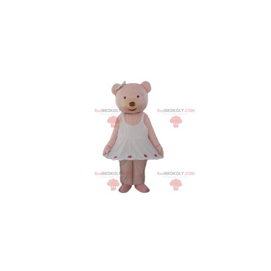 Mascote urso creme com um vestido branco muito fofo -