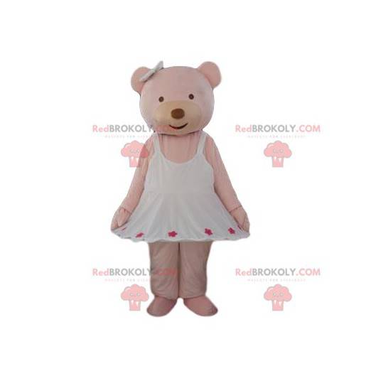 Mascote urso creme com um vestido branco muito fofo -