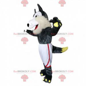 Mascote de lobo cinza e branco com shorts esportivos brancos -