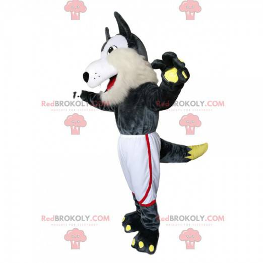 Szaro-biała maskotka wilk z białymi spodenkami sportowymi -