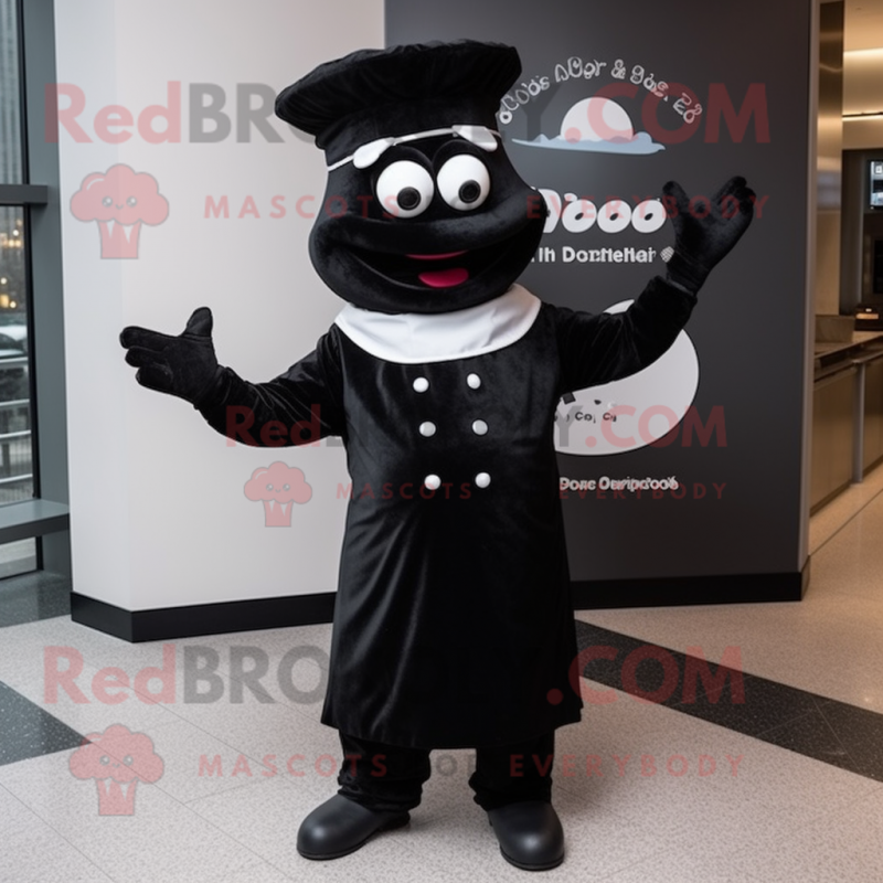 Black Pizza mascot costume character dressed with a Coat and Gloves Black Pizza mascot costume character dressed with a Coat and Gloves