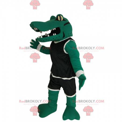 Krokodilmaskottchen mit schwarzer Sportbekleidung -