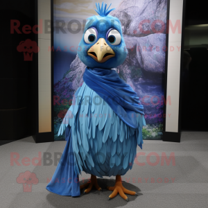 Blue Quail mascot costume character dressed with a Maxi Dress and Scarves