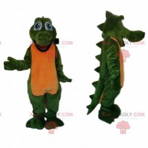 Engraçado mascote crocodilo verde com grandes olhos azuis -