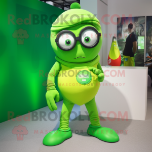 Lime Green Cyclops mascot costume character dressed with a Graphic Tee and Eyeglasses