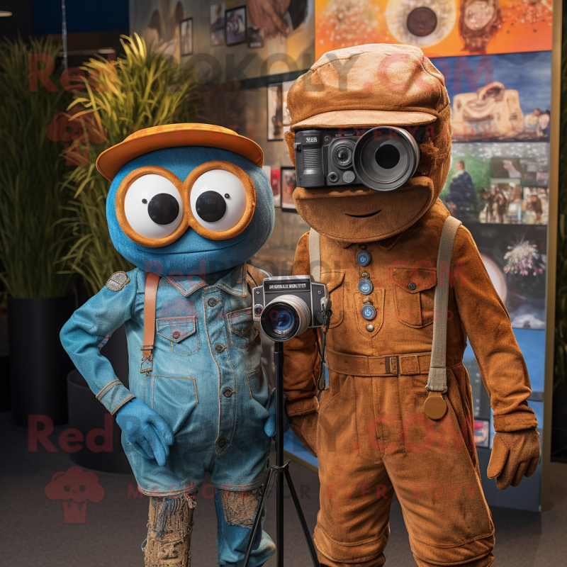 Rust Camera mascot costume character dressed with a Boyfriend Jeans and Berets Rust Camera mascot costume character dressed with a Boyfriend Jeans and Berets