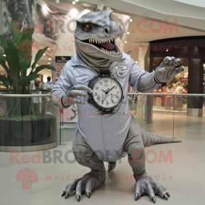 Silver T Rex mascot costume character dressed with a Romper and Bracelet watches