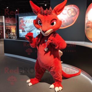 Red Chupacabra mascot costume character dressed with a Coat and Bracelets