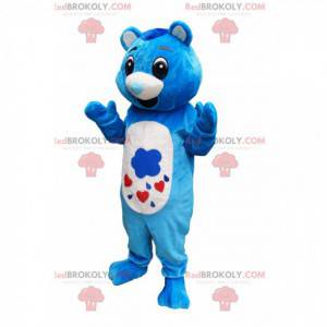 Mascote urso azul e branco com focinho em forma de coração -
