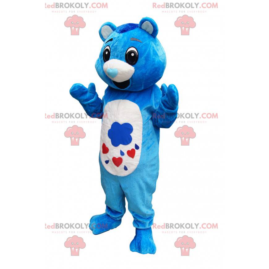Mascote urso azul e branco com focinho em forma de coração -