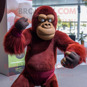 Maroon Orangutan mascot costume character dressed with a Tank Top and Gloves