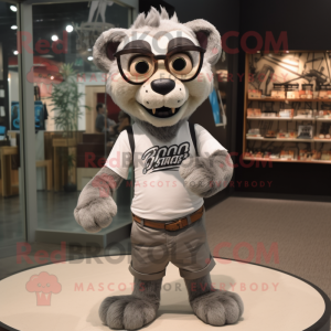 Gray Smilodon mascot costume character dressed with a Polo Tee and Eyeglasses