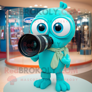 Turquoise Camera mascot costume character dressed with a Swimwear and Rings