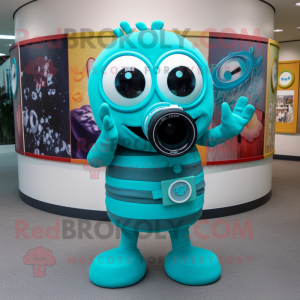 Turquoise Camera mascot costume character dressed with a Swimwear and Rings