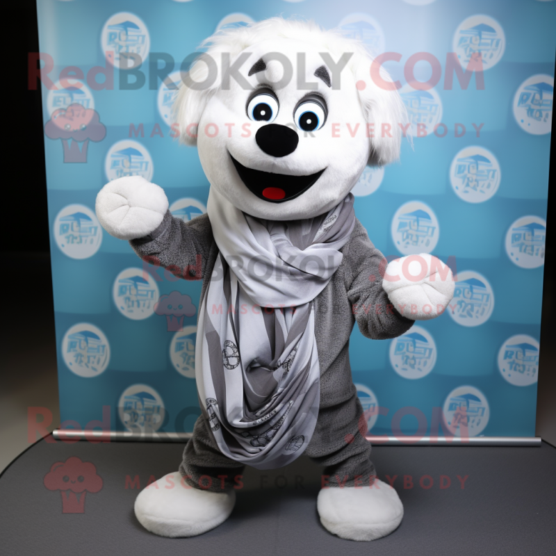Silver Bagels mascot costume character dressed with a Button-Up Shirt and Scarves Silver Bagels mascot costume character dressed with a Button-Up Shirt and Scarves