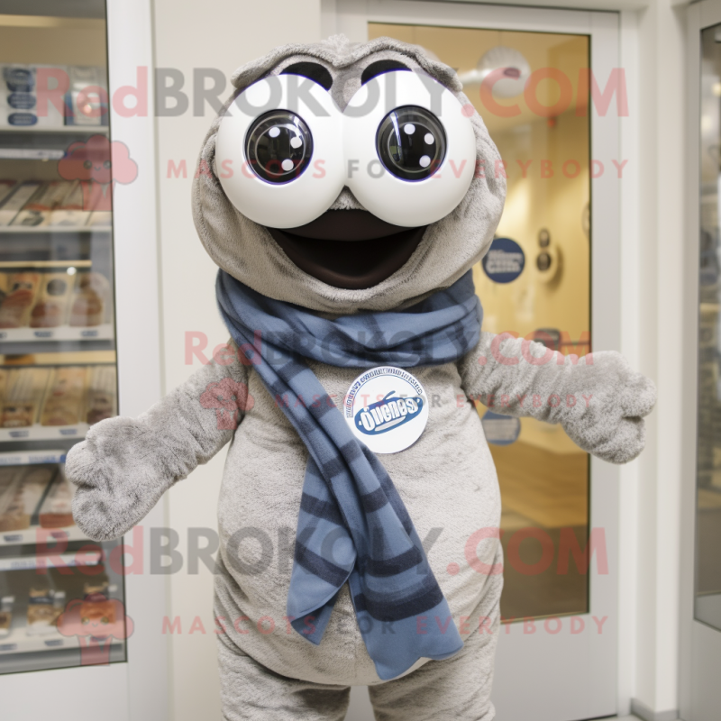 Silver Bagels mascot costume character dressed with a Button-Up Shirt and Scarves Silver Bagels mascot costume character dressed with a Button-Up Shirt and Scarves