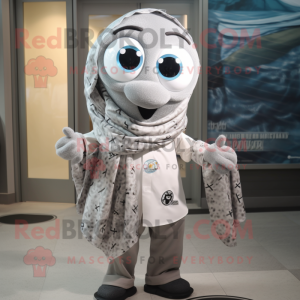 Silver Bagels mascot costume character dressed with a Button-Up Shirt and Scarves