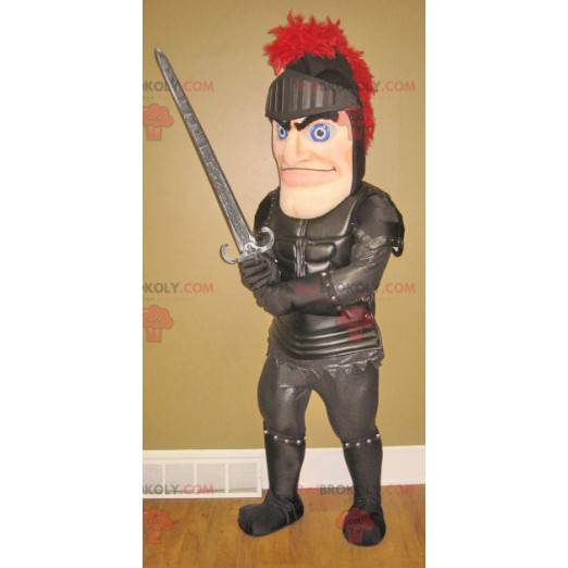 Knight maskot med svart rustning - Redbrokoly.com