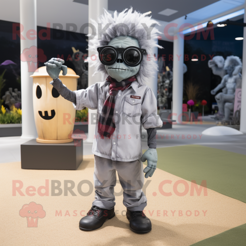 Gray Graveyard mascot costume character dressed with a Chinos and Sunglasses Gray Graveyard mascot costume character dressed with a Chinos and Sunglasses