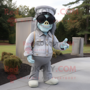 Gray Graveyard mascot costume character dressed with a Chinos and Sunglasses