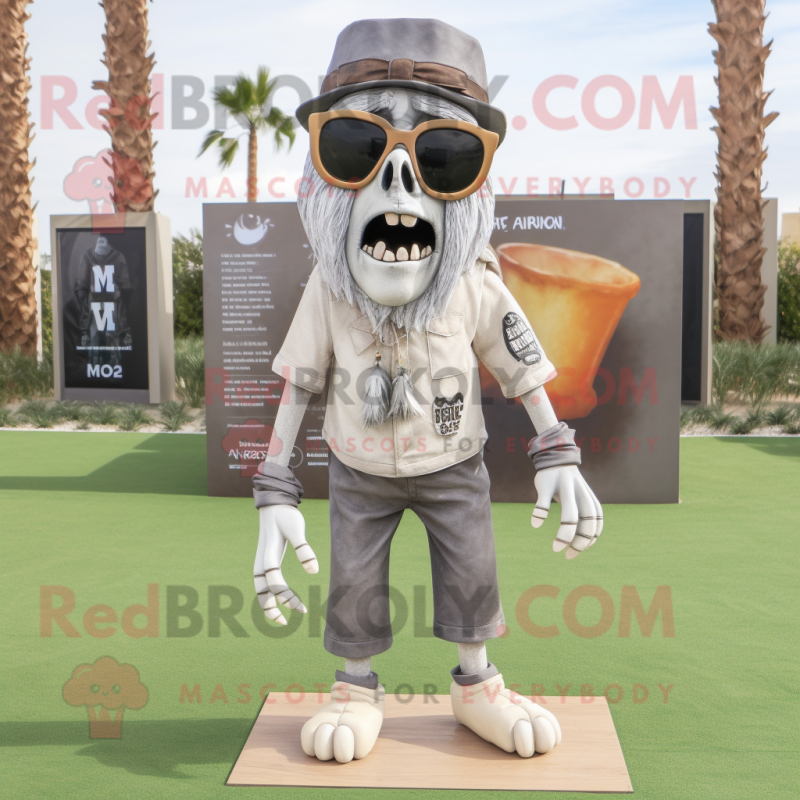 Gray Graveyard mascot costume character dressed with a Chinos and Sunglasses