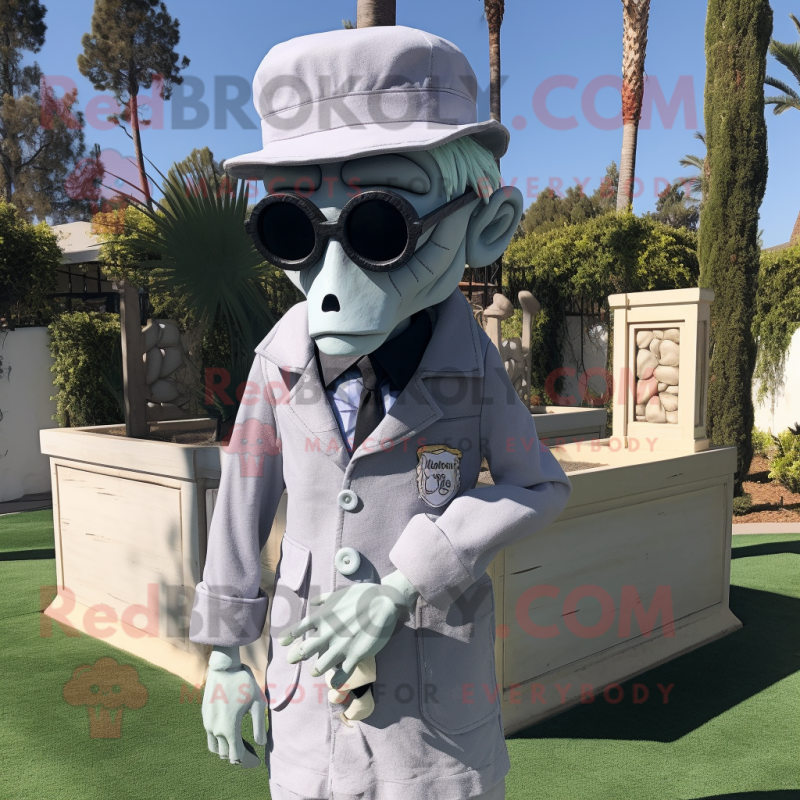 Gray Graveyard mascot costume character dressed with a Chinos and Sunglasses Gray Graveyard mascot costume character dressed with a Chinos and Sunglasses