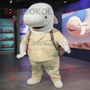 Cream Beluga Whale mascot costume character dressed with a Cargo Shorts and Caps