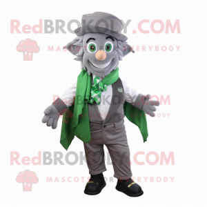 Grå Leprechaun maskot kostyme karakter kledd med en Poplin skjorte og skjerf klips