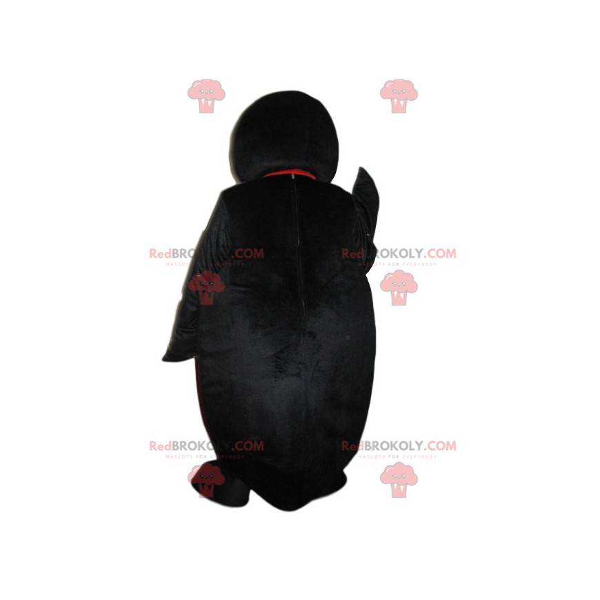 Okouzlující maskot tučňáka, který na nás mrká - Redbrokoly.com