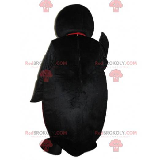 Charmig pingvinmaskot som blinkar till oss - Redbrokoly.com