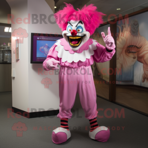Personaje de disfraz de mascota Pink Evil Clown vestido con pantalones capri y fajines