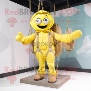 Lemon Yellow Trapeze Artist mascot costume character dressed with a Cargo Pants and Gloves