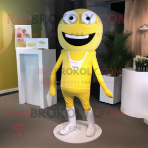 Yellow Wedding Cake mascot costume character dressed with a Yoga Pants and Suspenders