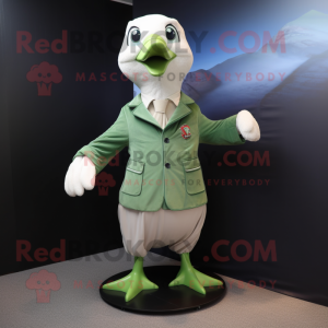 Green Seagull mascot costume character dressed with a Jacket and Tie pins