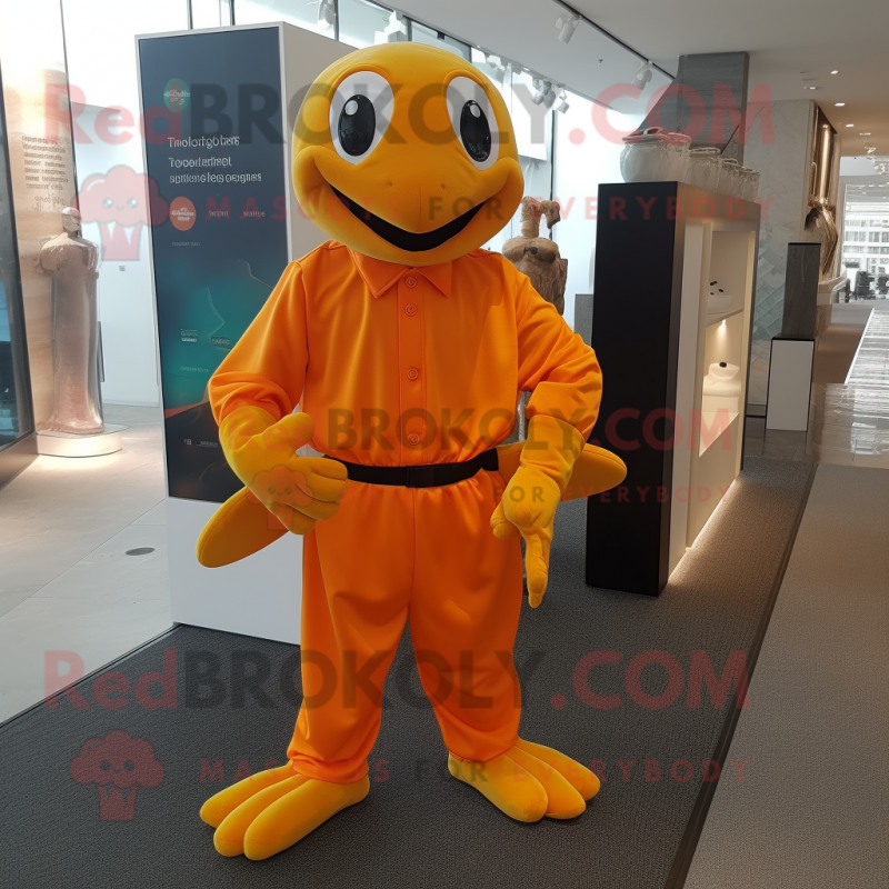 Orange Sea Turtle mascot costume character dressed with a Trousers and Shoe clips