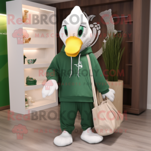 Personaje de disfraz de mascota de cisne verde vestido con una sudadera con capucha y bolsos de mano