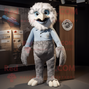 Silver Eagle mascot costume character dressed with a Dungarees and Foot pads