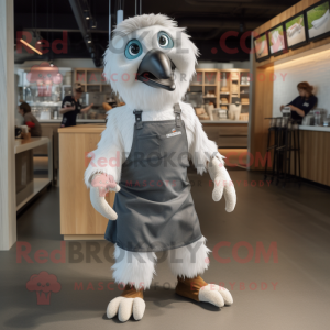 Silver Eagle mascot costume character dressed with a Dungarees and Foot pads