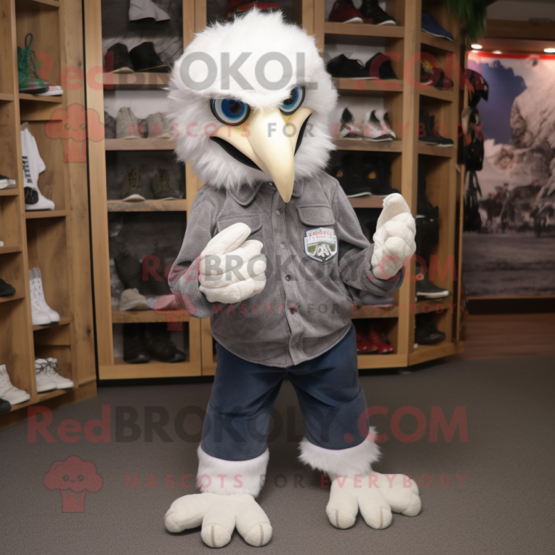 Silver Eagle mascot costume character dressed with a Dungarees and Foot pads